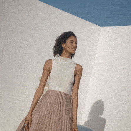 Video of model shielding face from sun