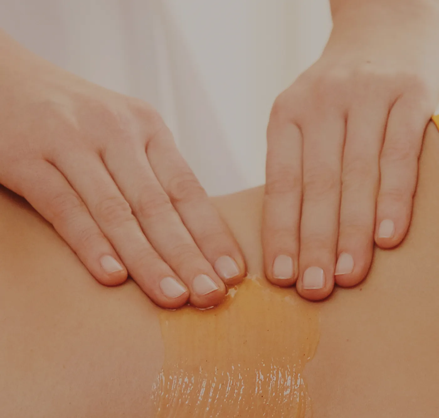 woman's abdomen receives a massage
