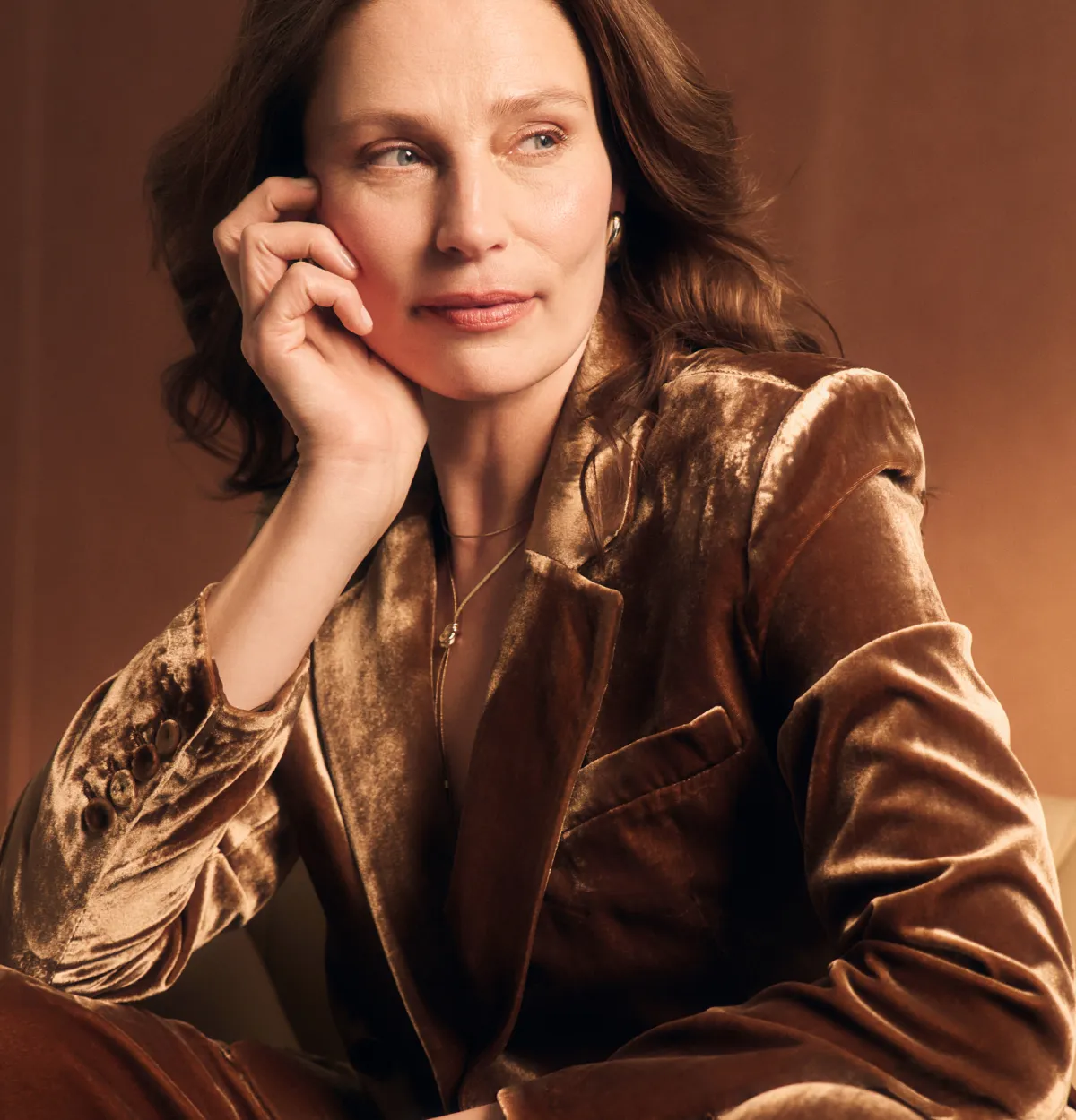 woman in her fifties stares intensely to the horizon